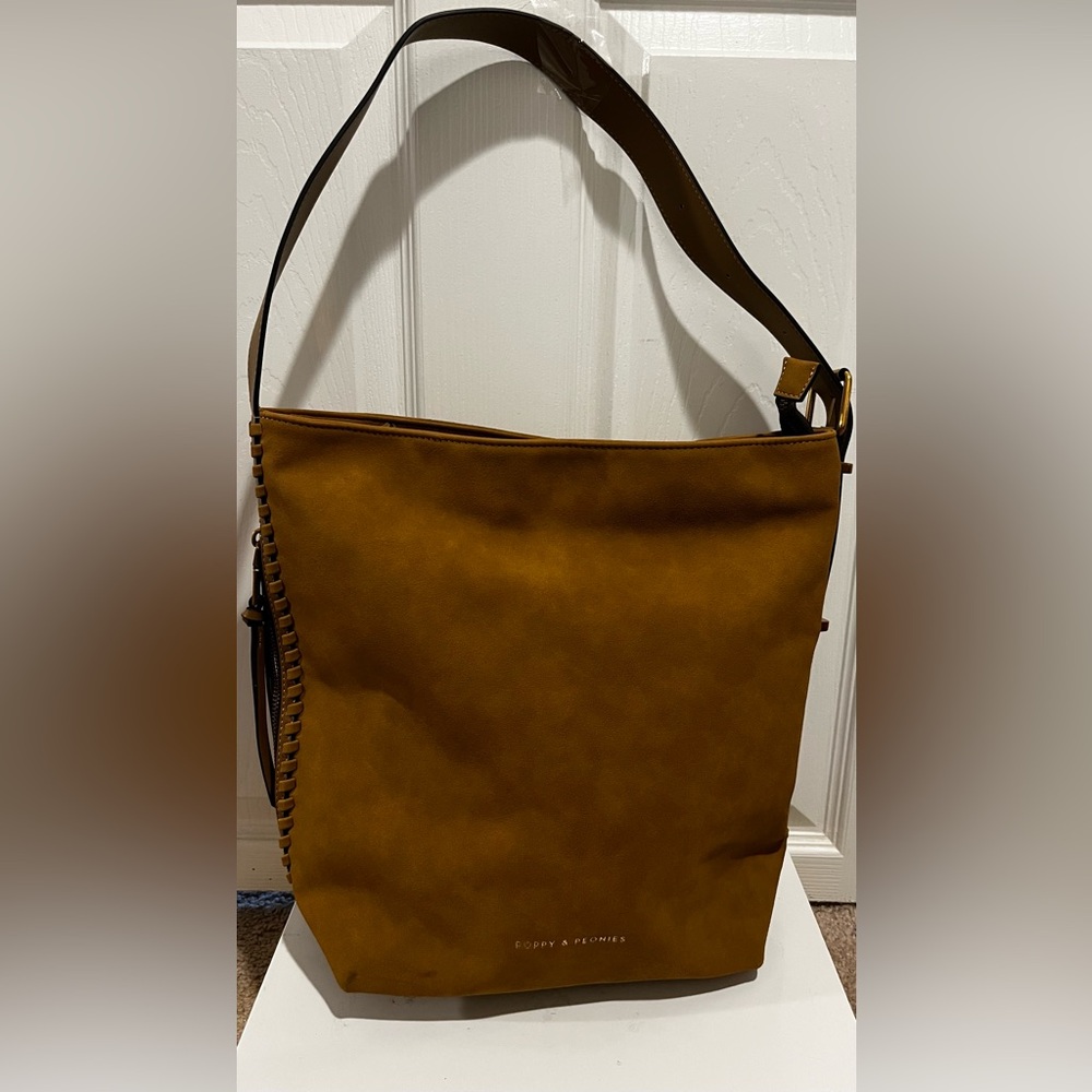 POPPY & PEONIES The Studio bucket bag in chestnut brown suede